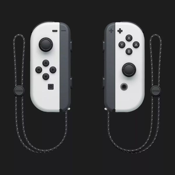 Портативная игровая приставка Nintendo Switch OLED with White Joy-Con (045496453435) 158ddf48-3c08-4dae-a831-d11cd5fb22f6 фото