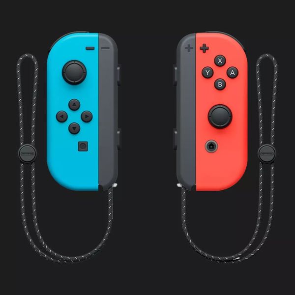 Портативная игровая приставка Nintendo Switch OLED with Neon Blue and Neon Red Joy-Con (045496883409) 0936af12-b6f7-4603-b18b-a402e29c6594 фото